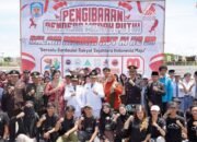 Bendera Raksasa 10×6 Meter Berkibar Megah di Jembatan Merdeka Puruk Cahu