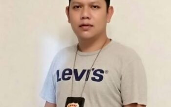 TIRAI ASAP DI BALIK LUMPUHNYA MAKAN GRATIS: MENAKAR LOGIKA “REM DARURAT FISKAL” SAAT DOLAR Rp18.000