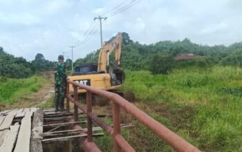 Rancang Tumpuan Gambangan, Satgas Tmmd Kodim 0313/KPR Siapkan Perlintasan Alat Berat di Jembatan T. Tahal