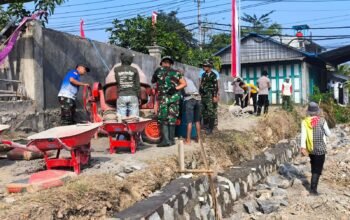 Satgas TMMD KE-129 Kodim 0726/skh Kebut Pengerjaan Pembuatan Talud Di Dk. Jengkangan Parangjoro Sukoharjo