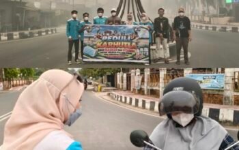 Kabut Asap Belum Mereda, KNPI Pulang Pisau Turun ke Jalan Bagikan Masker dan Vitamin Gratis